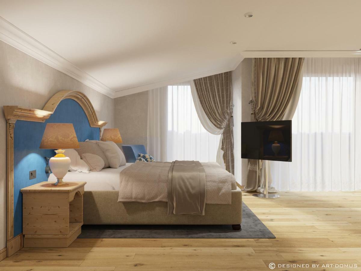 Hotel Sassongher Corvara In Badia Bagian luar foto