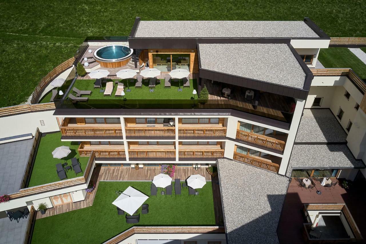 Hotel Sassongher Corvara In Badia Bagian luar foto